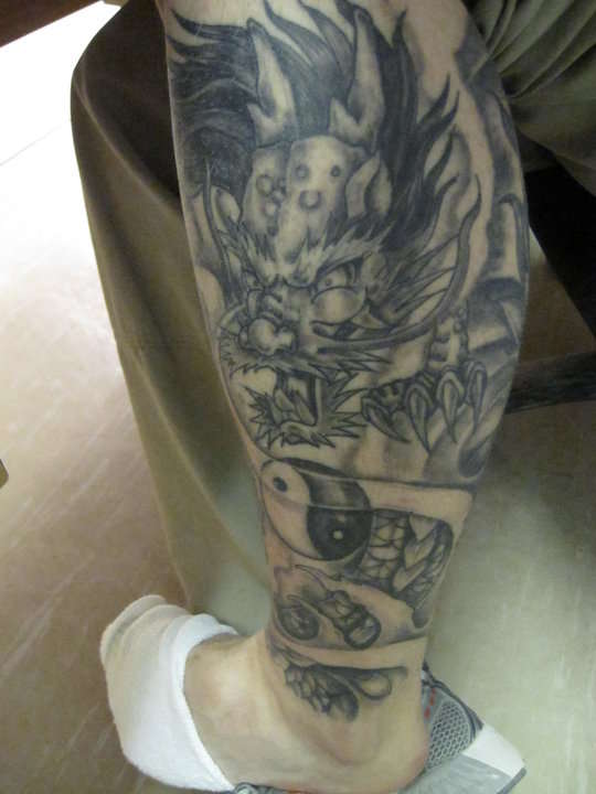 Fighting dragons tattoo