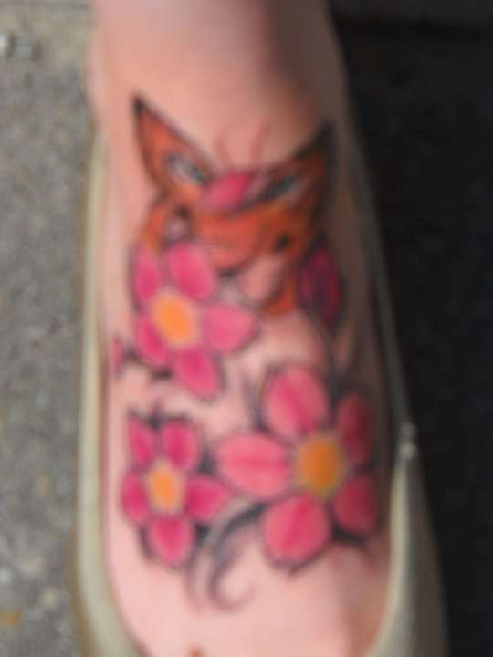 Tiger butterfly and flowers tattoo