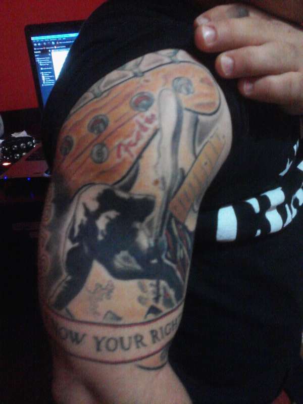 Front of Paul Simonon Tattoo tattoo
