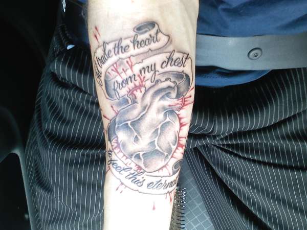 bleeding heart with banner tattoo