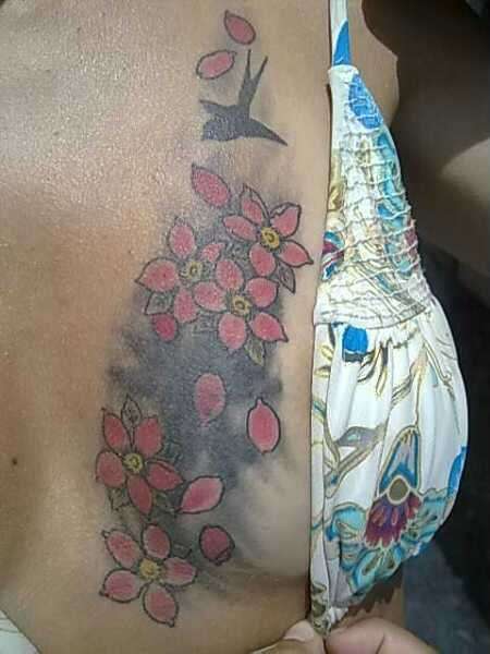 flower cover tattoo