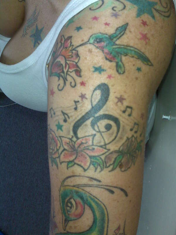 flowers/music tattoo