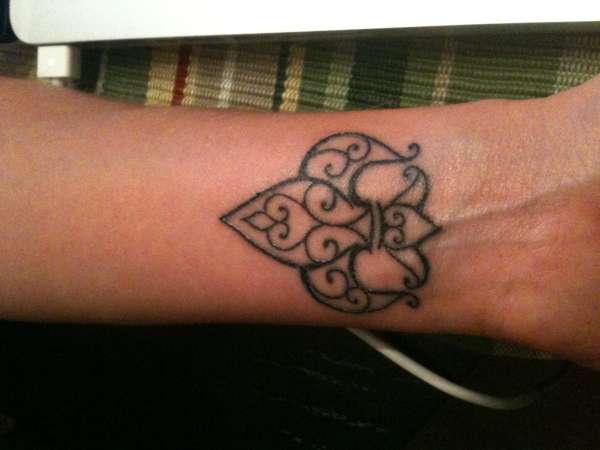 ironwork fleur de lis tattoo