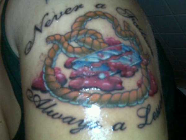 razor blade , blood , rope :never a failure , always a lesson" tattoo