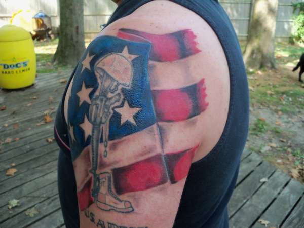 soldiers cross with flag tattoo