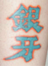 Anime logo tattoo