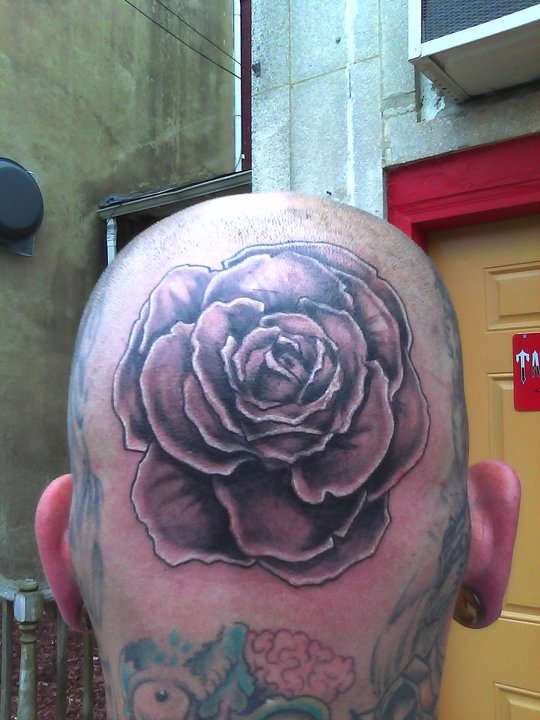 Black and gray rose tattoo