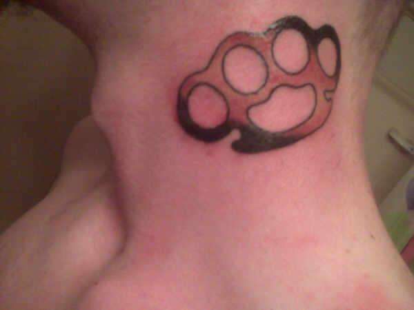 Brass knuckes. tattoo