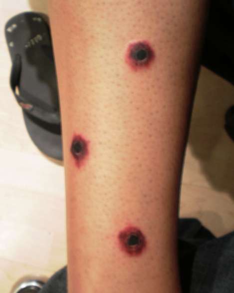 GUN SHOTS tattoo