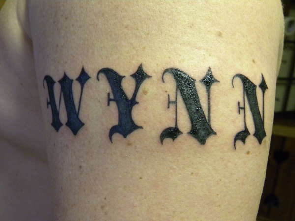Last name tattoo