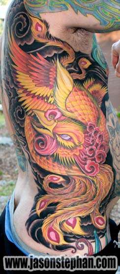 Phoenix rib panel tattoo
