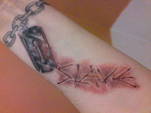 Slave and Blade tattoo