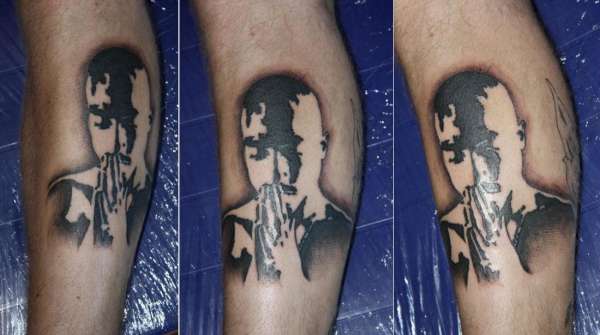 Stencil of 2Pac's face tattoo
