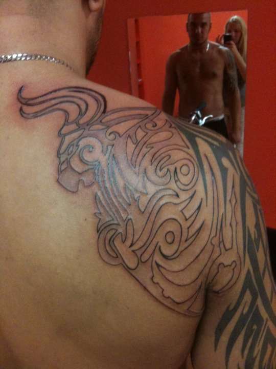 Tribal bull tattoo