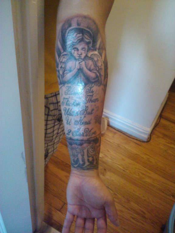 angle over scroll tattoo