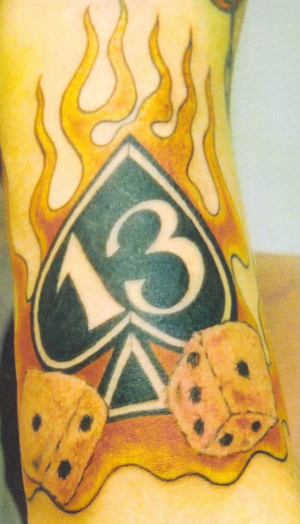 flaming spade tattoo
