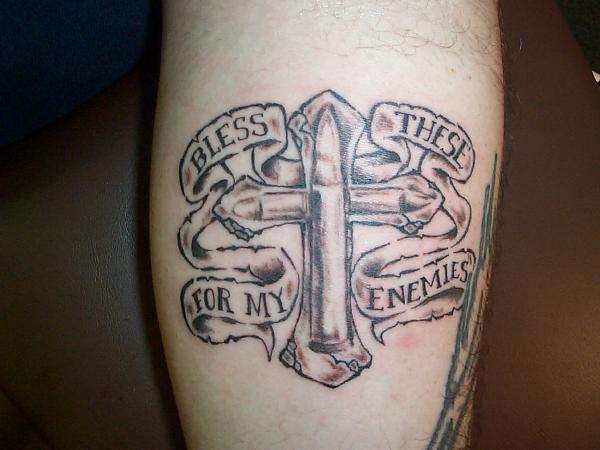 cross & bullets tattoo
