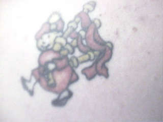 Bag piper tattoo