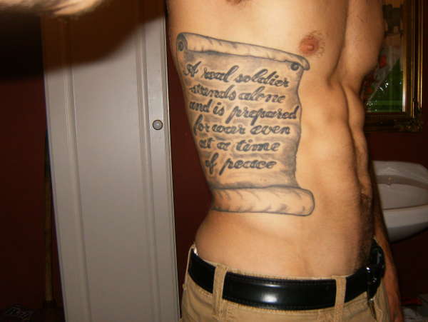 rib scroll tattoo