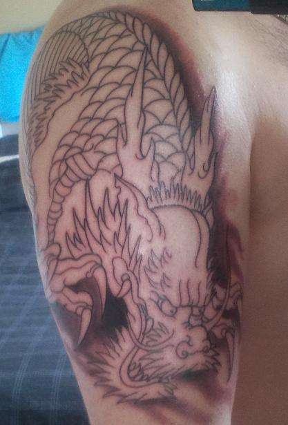 Black and Grey dragon after one sitting. 4.5 Hours. tattoo