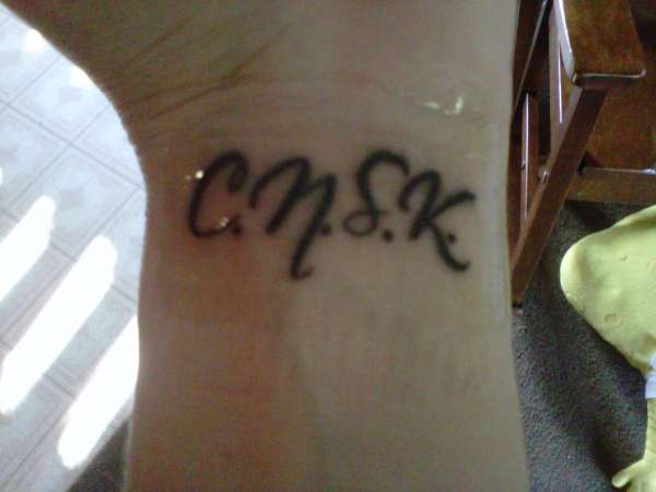 C.N.S.K. tattoo