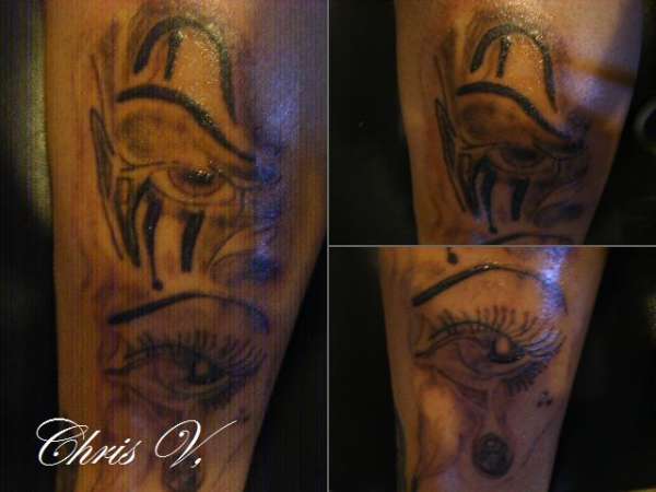 Clown & eye tear drop tattoo