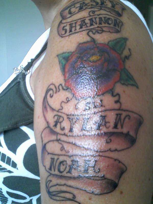 Flower/ ribbons tattoo