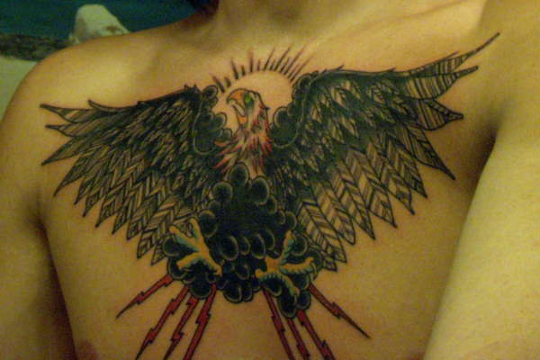 Hawk/eagle chest peace tattoo