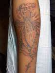 Parying Hands tattoo