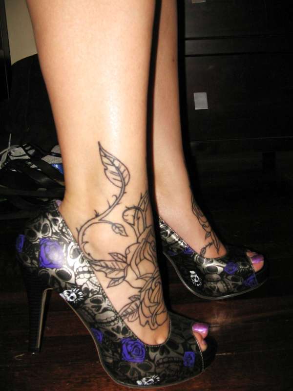 Side View of roses tattoo