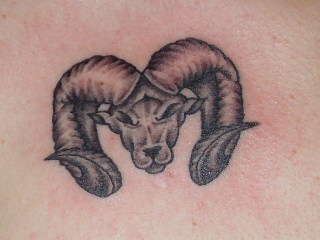 aries symbol tattoo