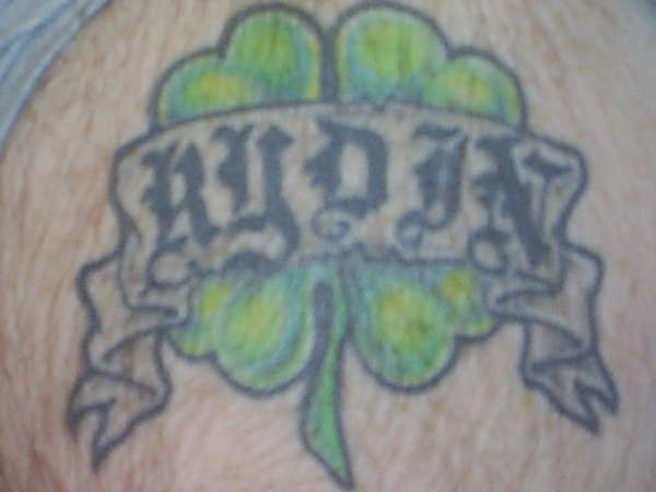 shamrock / last name tattoo