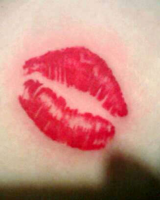 lipstick print tattoo