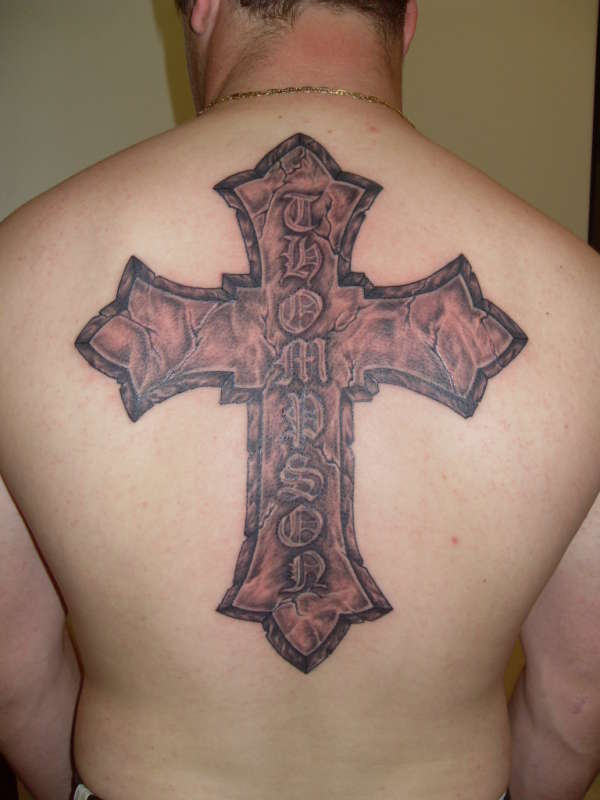 stonework cross tattoo