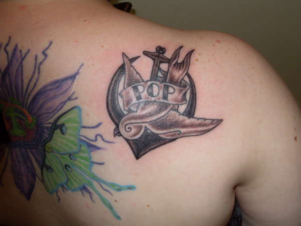 swallow and anchor in memory piece tattoo