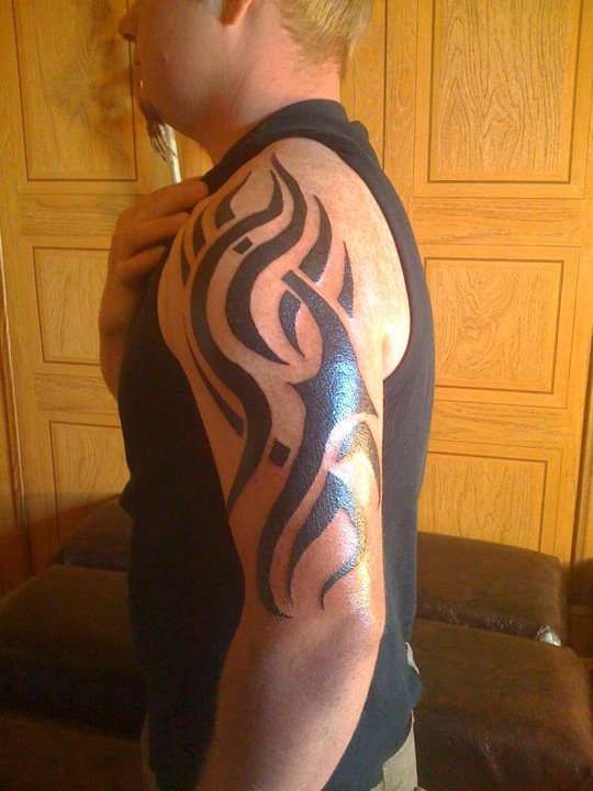 tribal half sleeve tattoo
