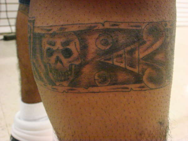 AZTEC BAND W/ RAIDERS LOGO tattoo