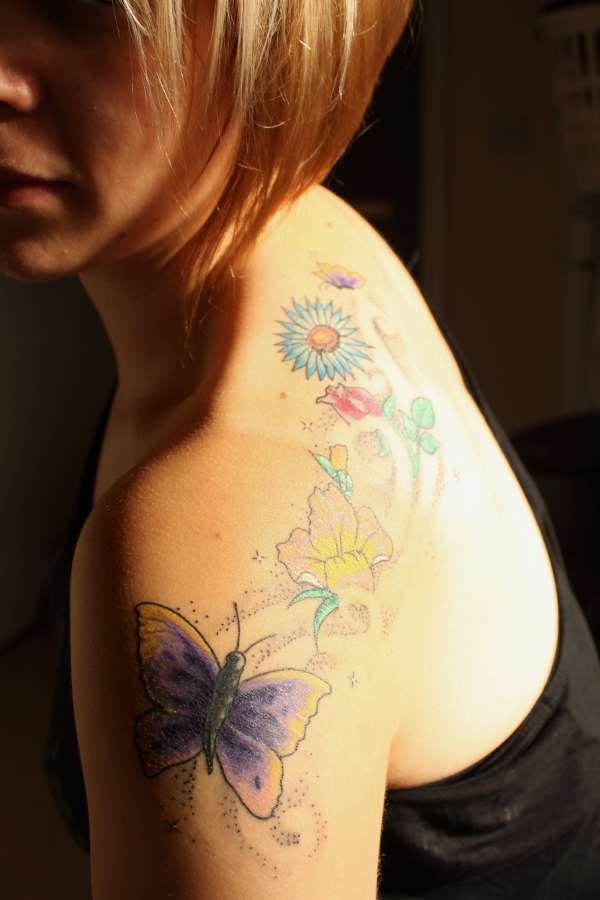 Butterflies and flowers tattoo