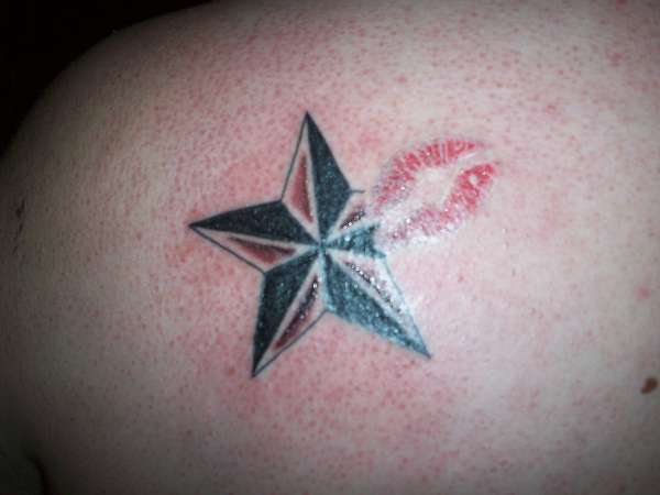 STAR W/ LIPS tattoo
