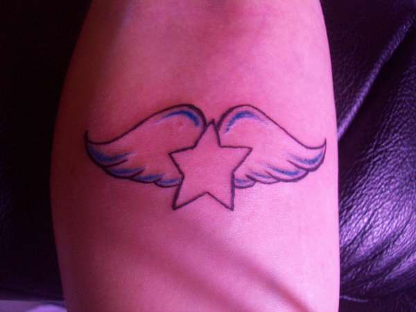 Star with wings tattoo