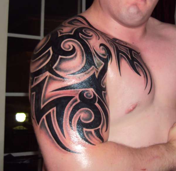 Tribal Chest/Shoulder/Arm peice tattoo