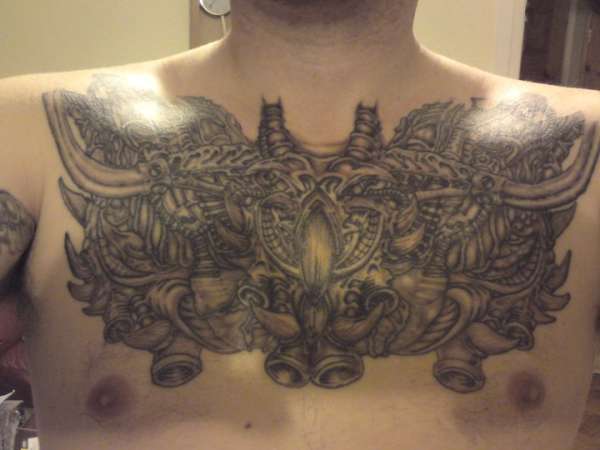 biomech chest tattoo