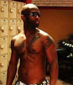 chest n arms tattoo