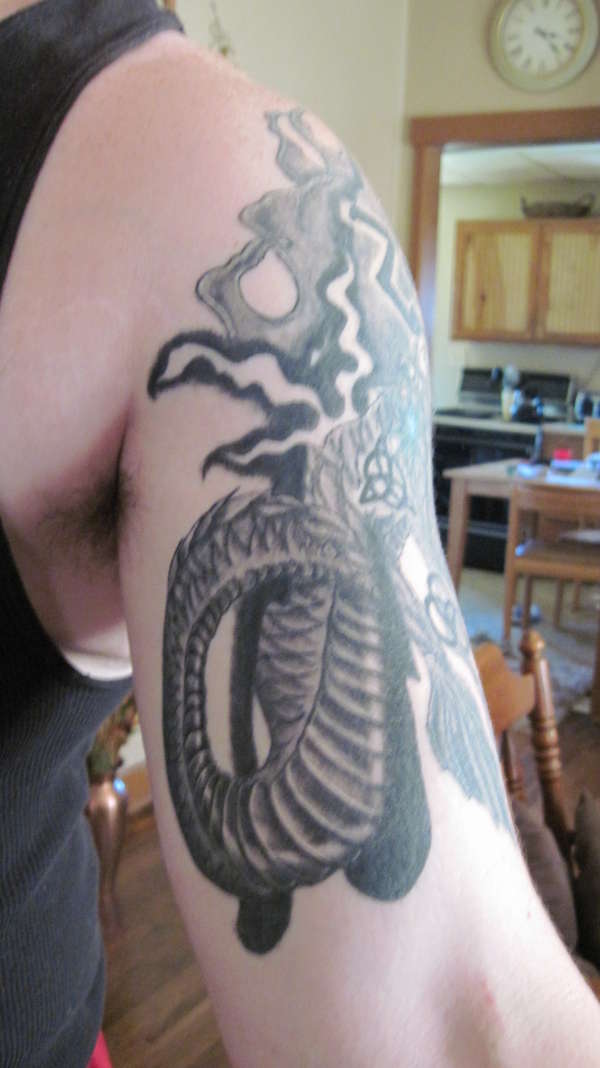 side view jap dragon/ led zepp tat tattoo