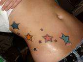 stars down the side tattoo
