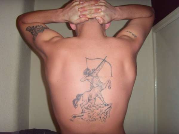 starsign on mi back tattoo