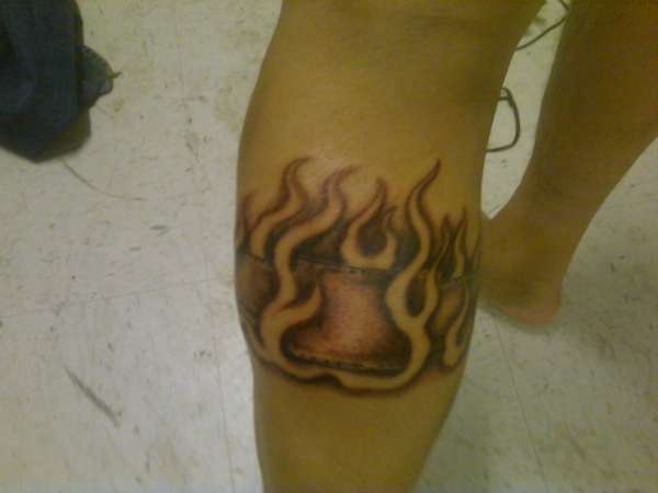 Bowtie in flames tattoo