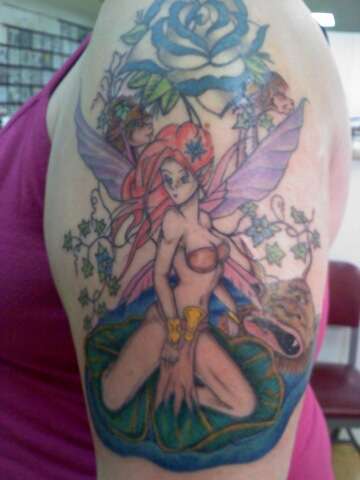 Fairy w/ mythical creatures tattoo