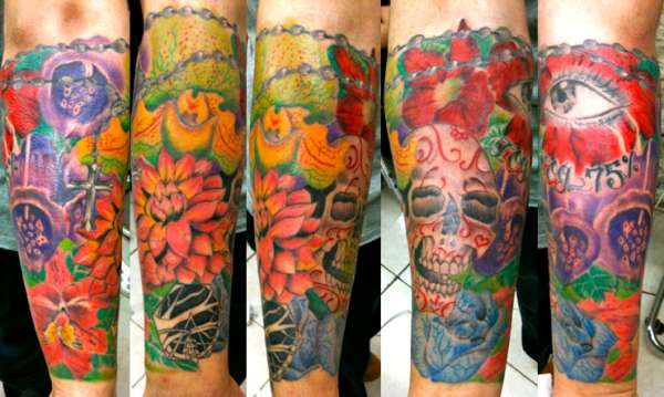 Flower half a sleeve tattoo