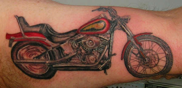 Harley on inside arm tattoo